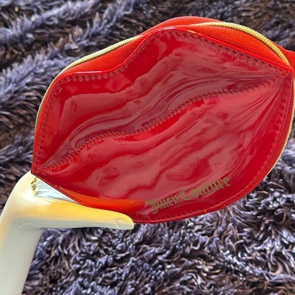 Juicy Couture Handbags - Juicy Couture red lip shaped jewelry storage travel case